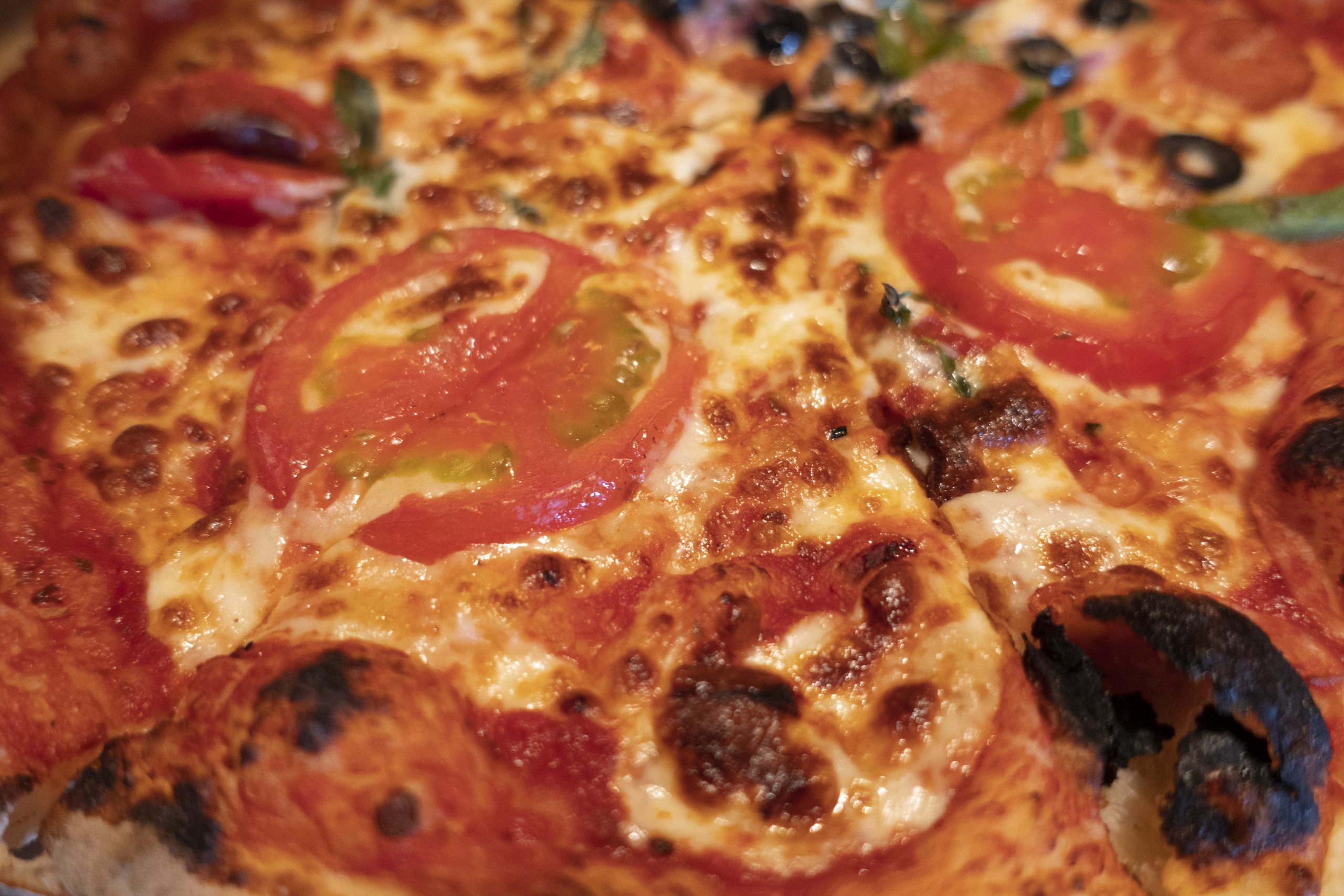 海屋咖啡的瑪格麗特pizza,是用新鮮牛番茄與莫扎瑞拉起司,看得出來火侯掌握非常均勻<br />。楊尚倫攝