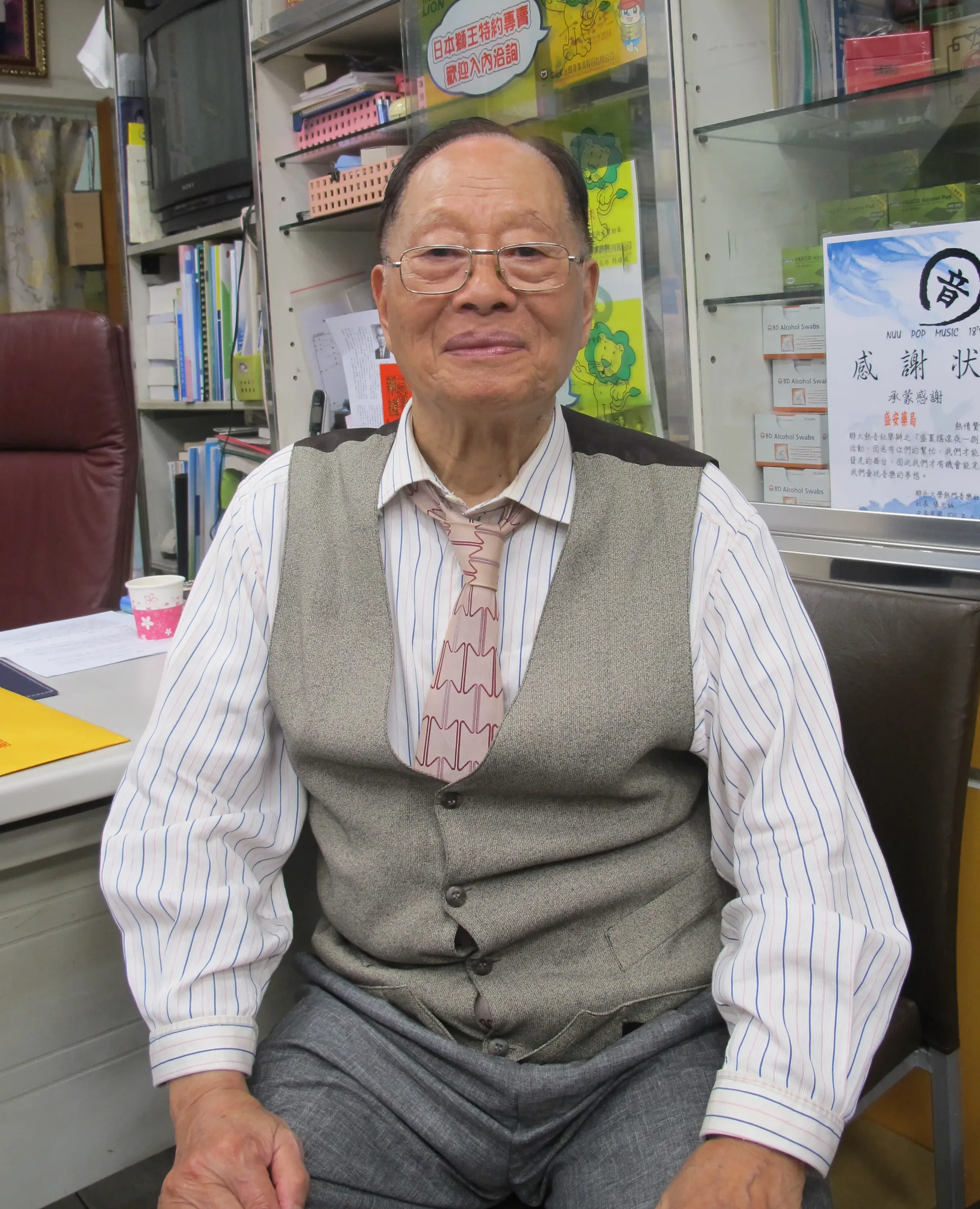 2018年謝肇楨接受訪問,回顧1935年「國歌少年」詹德坤的故事。何來美攝