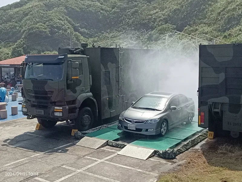 新北市政府11日在石門區進行核安演習實兵演練，演習也辦理車輛進出輻射除污檢測作業。中央社