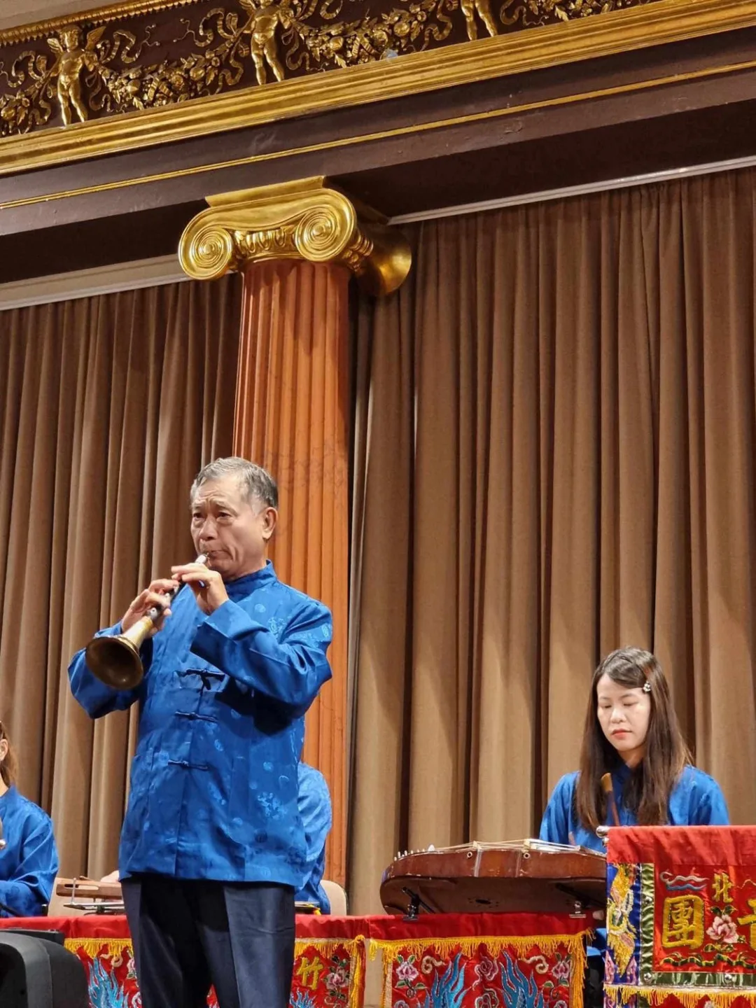 田文光榮獲第12屆教育部藝術教育貢獻獎。圖為他於今年9月,獲邀前往奧地利等國演奏客家八音。翻攝田屋北管八音團FB