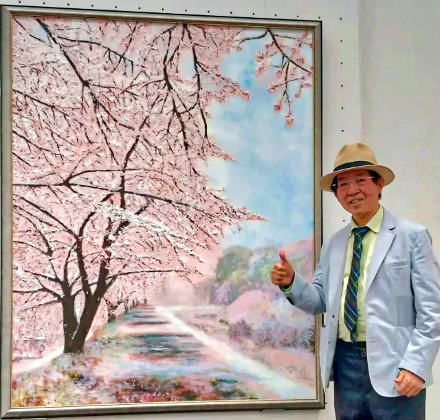 周東寬的油畫「雪降的櫻花徑」，2024年獲得日本內閣總理大臣賞。周東寬提供