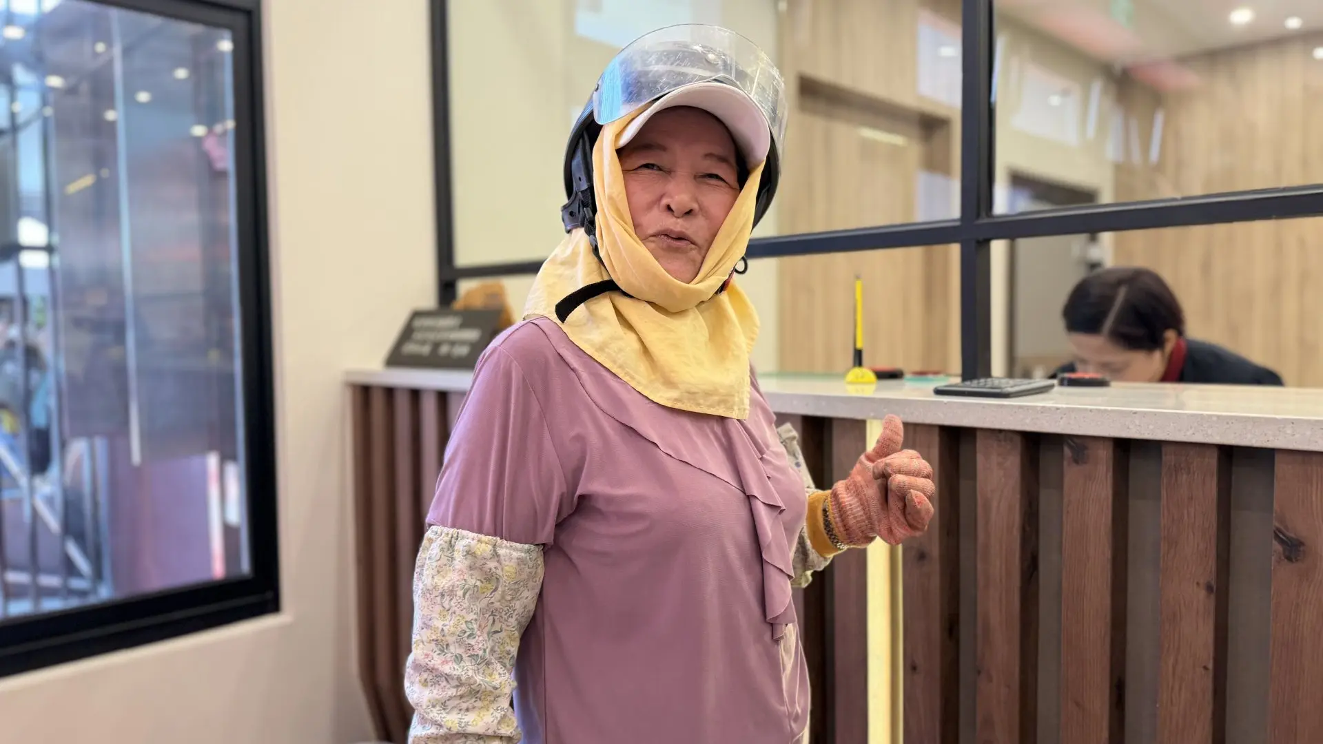 陳全妹開朗地對著鏡頭微笑。李慧宜攝